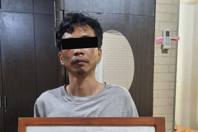 AR, pria di Jakarta Pusat yang mengaku staf anggota dewan dan bisa membantu memasukkan jadi anggota Polri. Foto: Dok. Istimewa